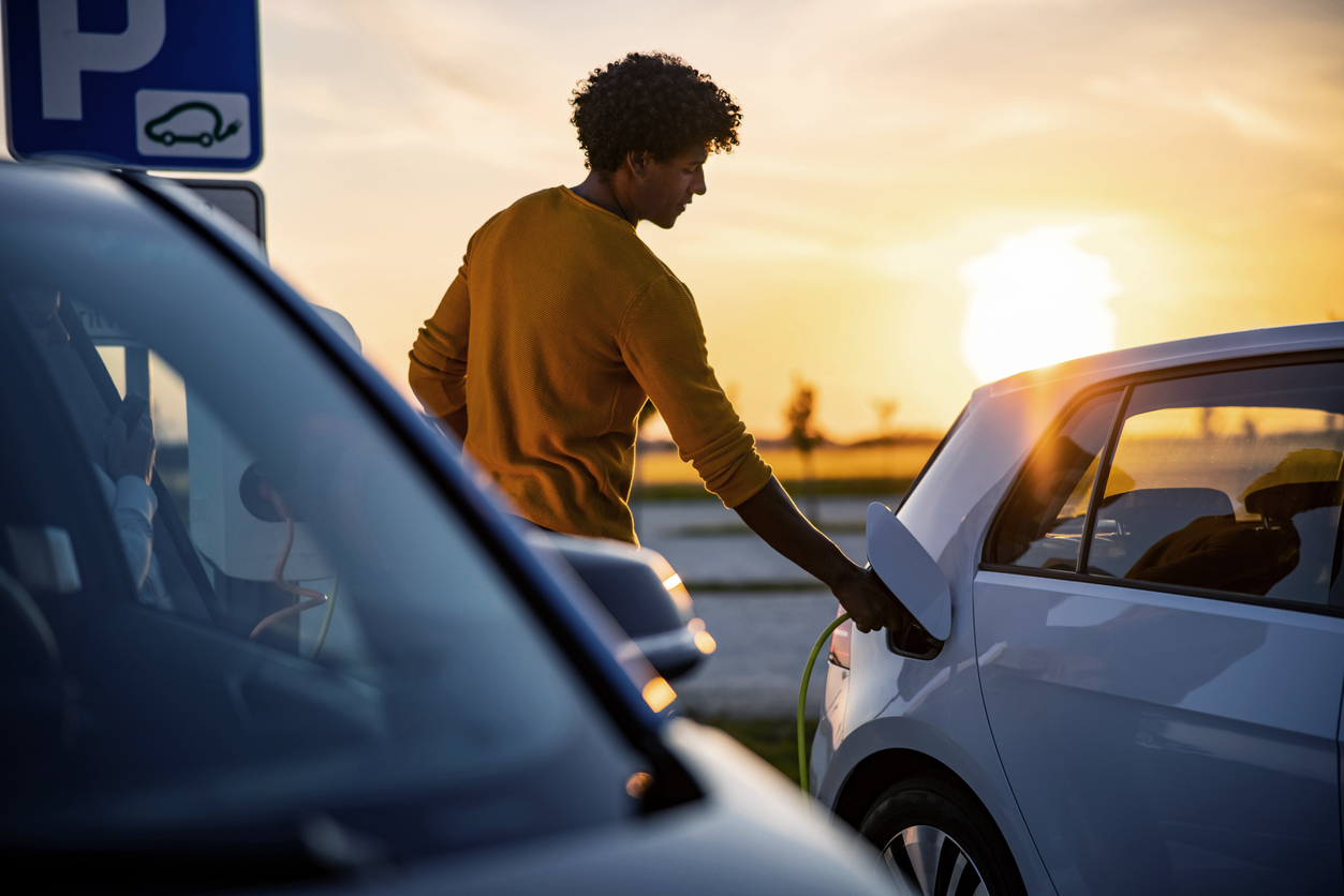 Man Charging EV - eEnergy colour styled