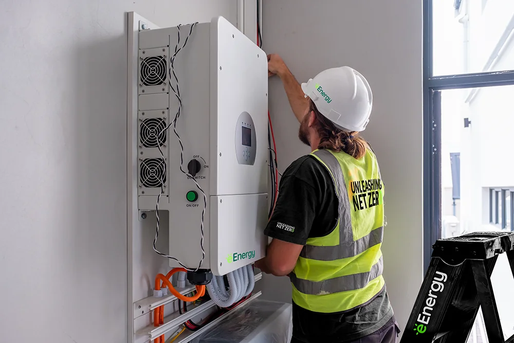 eEnergy-Man working on Inverter - Reduced